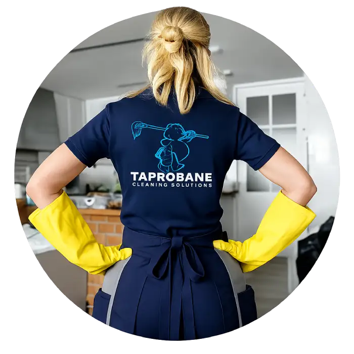 Taprobane Cleaning Solutions cleaner wearing a branded uniform in an Auckland kitchen